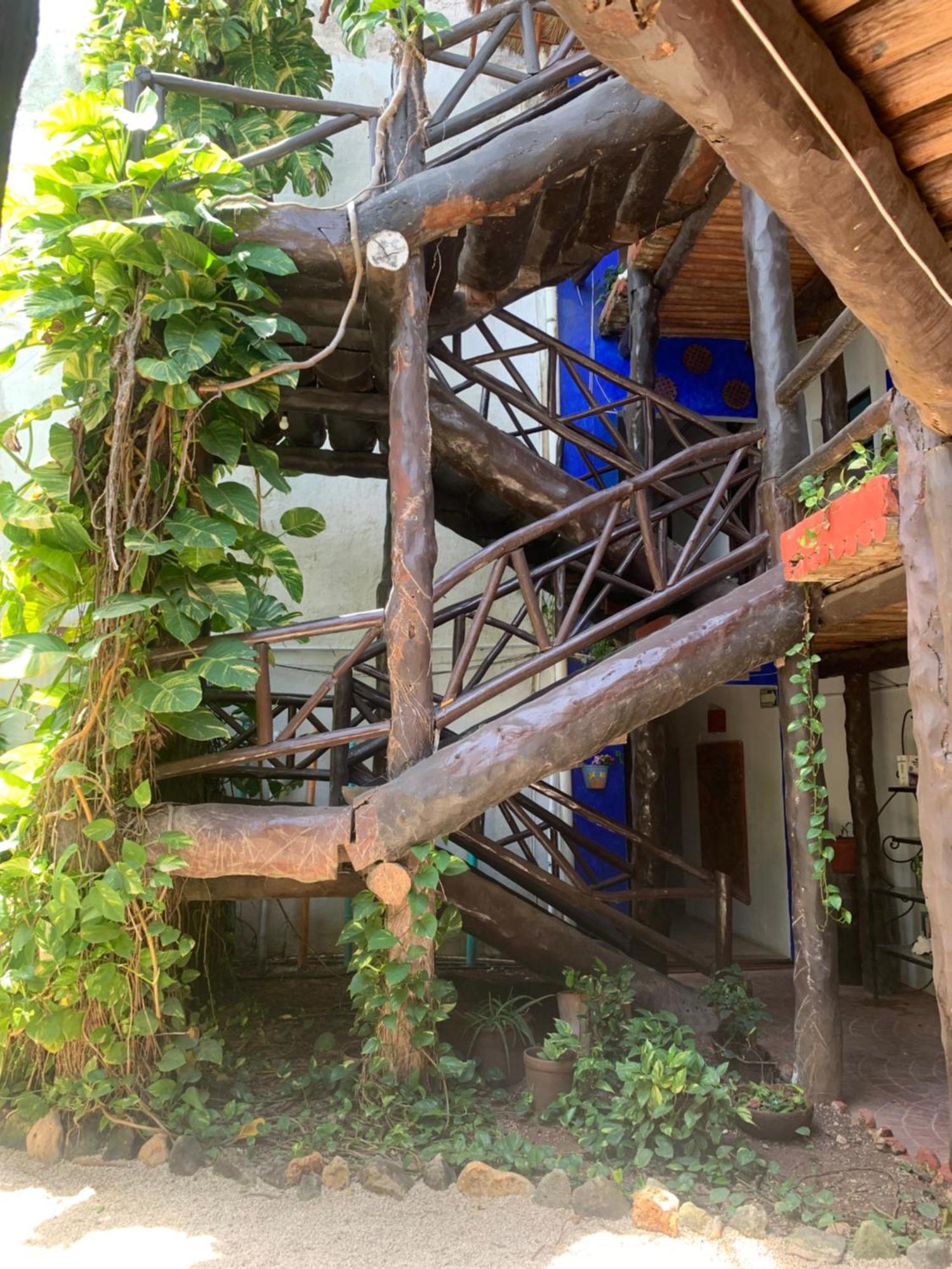 Casa Caribe Cancun Exterior photo Spiral staircase at the house