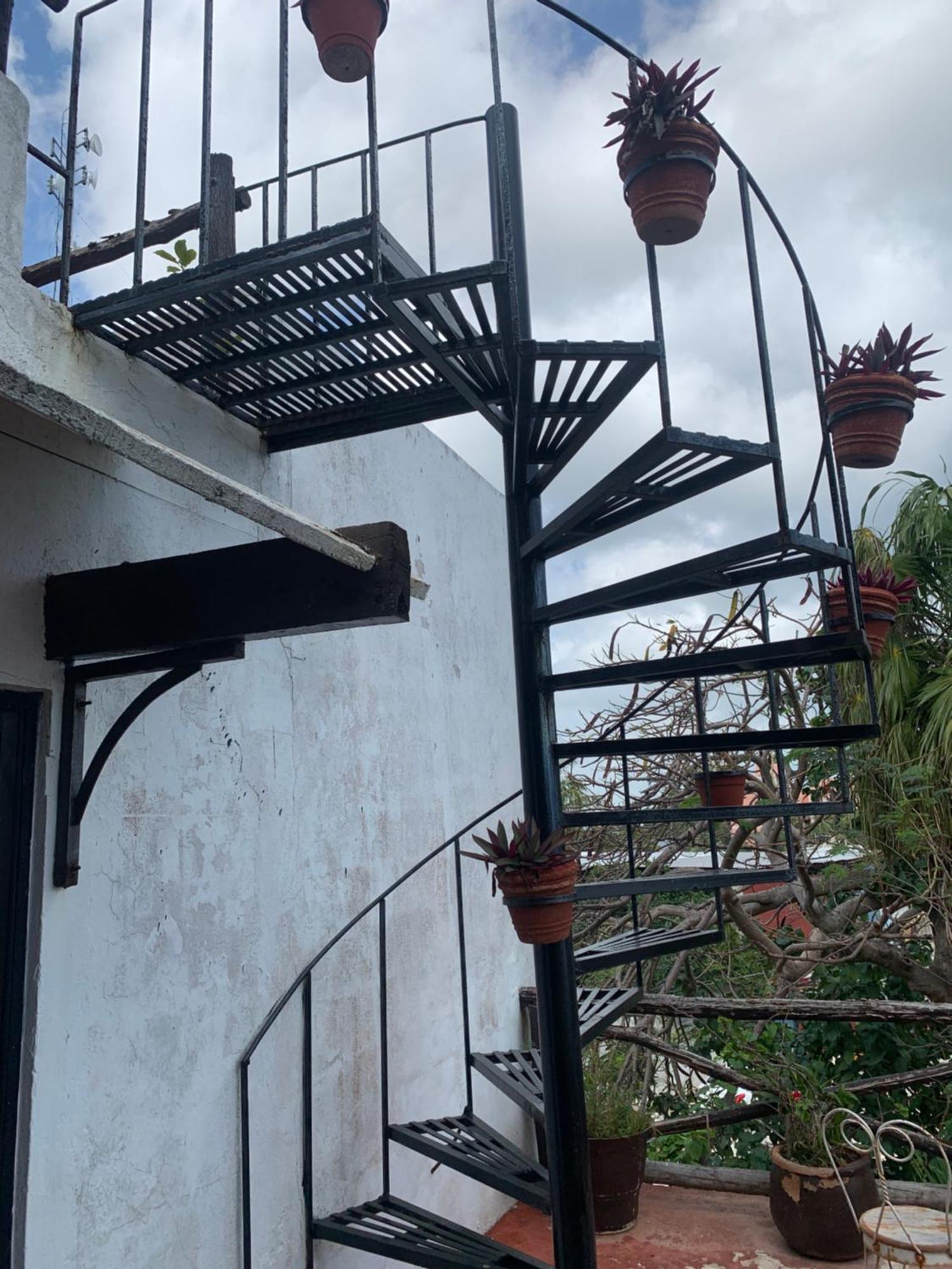 Casa Caribe Cancun Exterior photo Spiral staircase