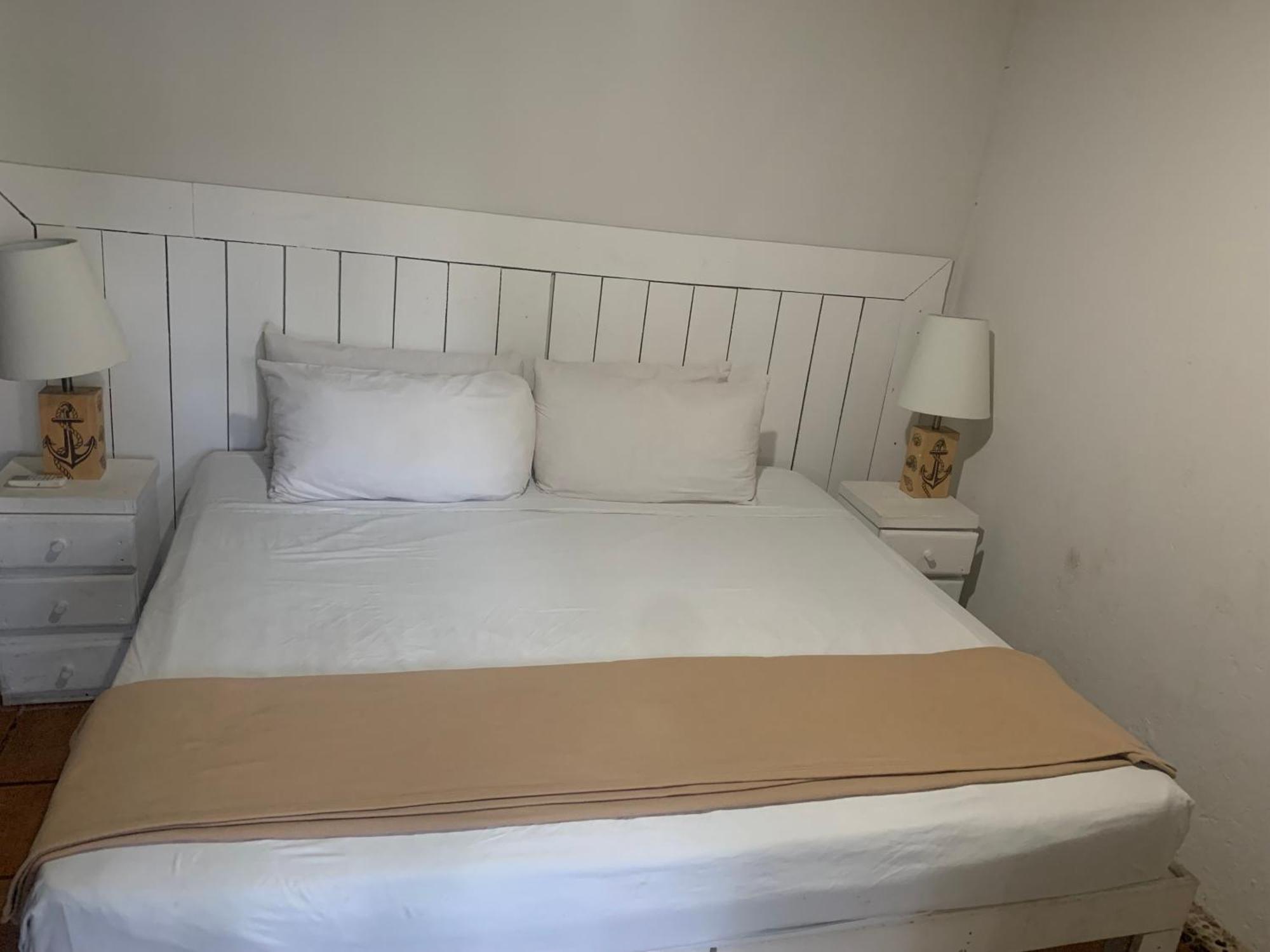 Casa Caribe Cancun Exterior photo A bed