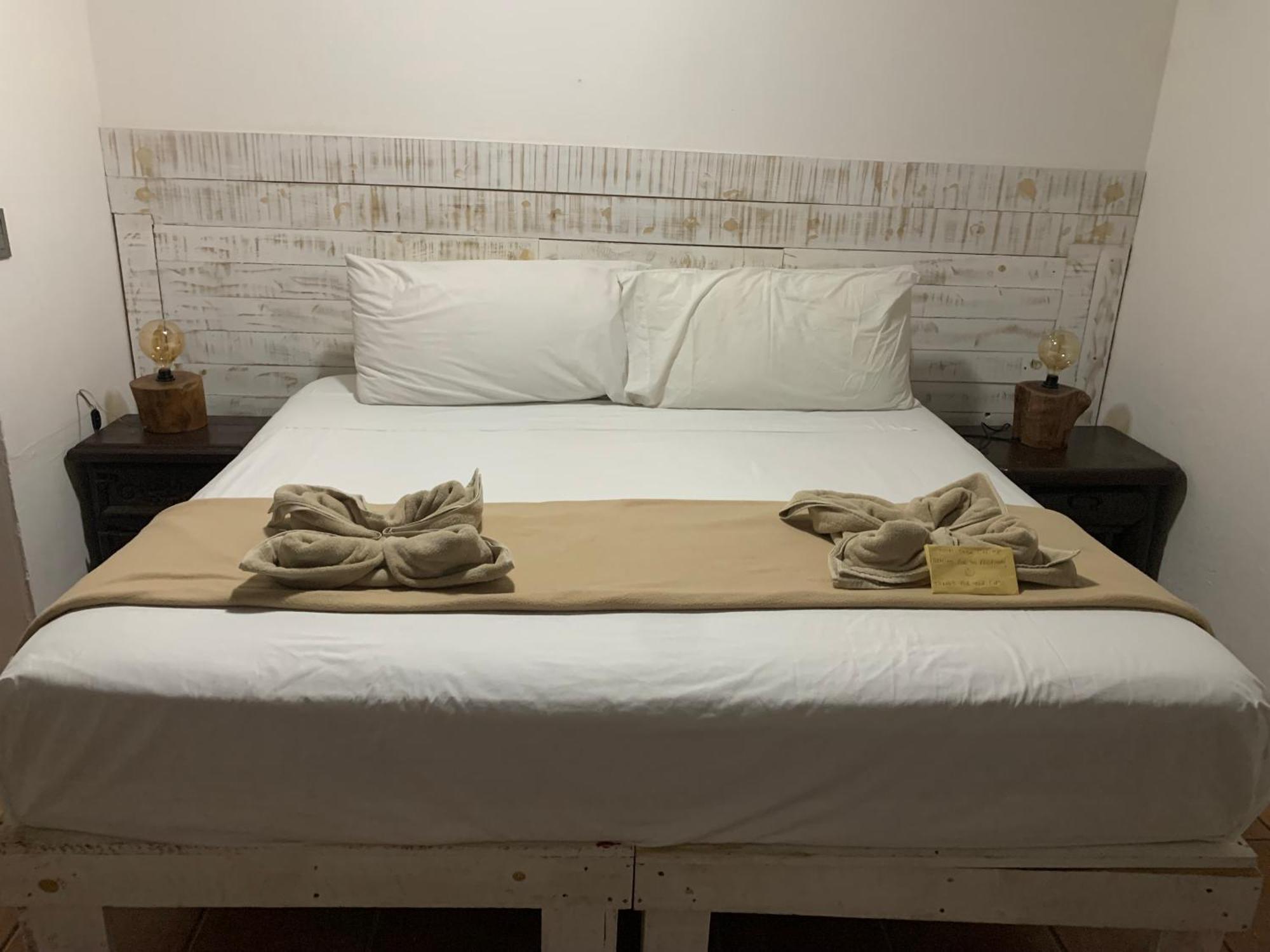 Casa Caribe Cancun Exterior photo A bed